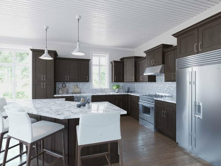 Luxury kitchen remodel with dark cabinets and marble countertops by Torres Remodeling